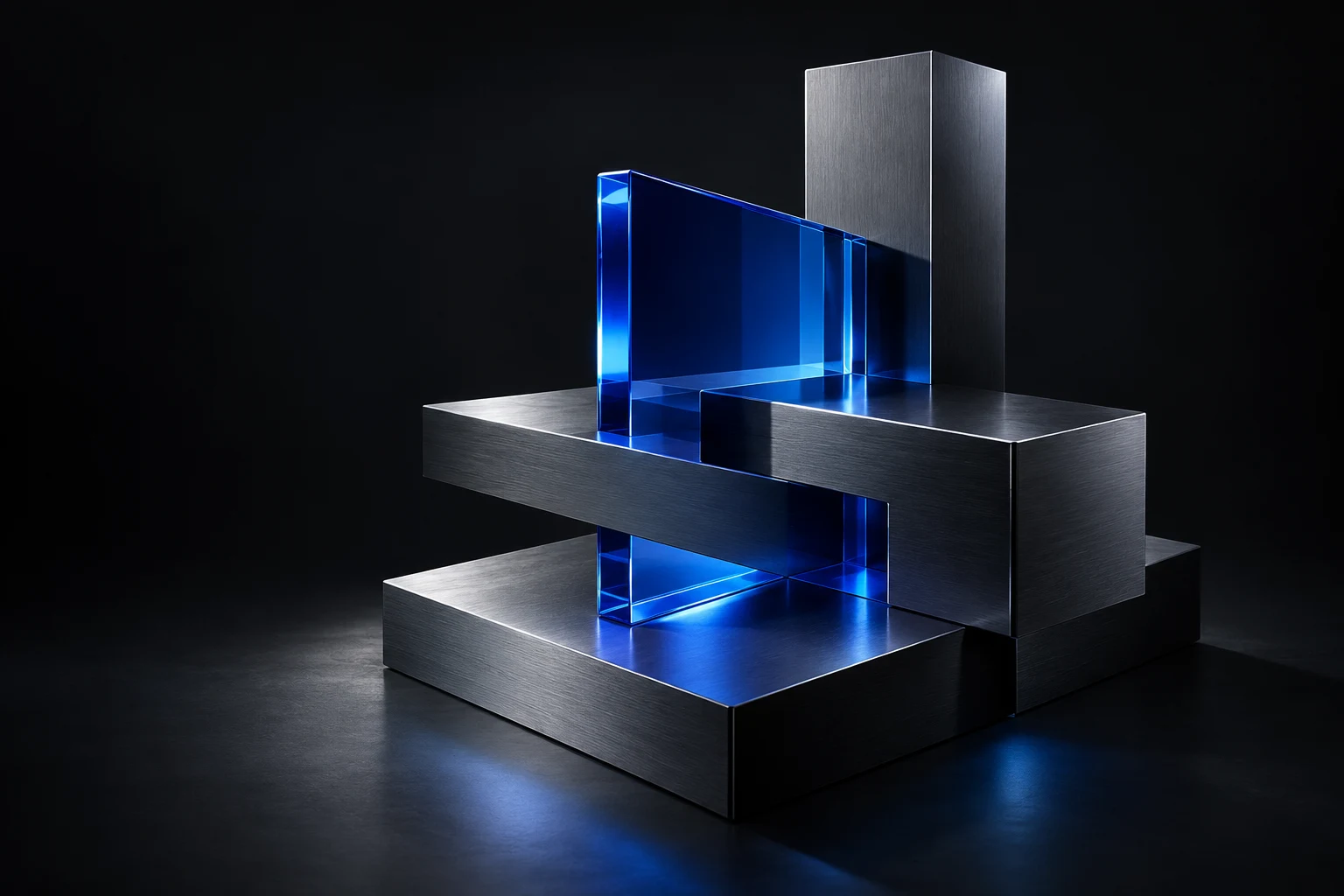 Precision graphite modules intersected by an illuminated blue glass plane